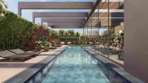 Piscina adulto com iluminação subaquatica, tratamento de ozônio e infraestrutura para climatização.